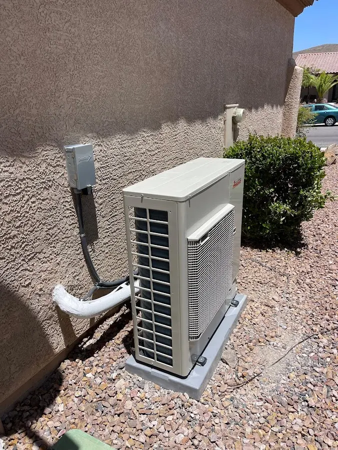 Residential air conditioning condenser unit in Kimball